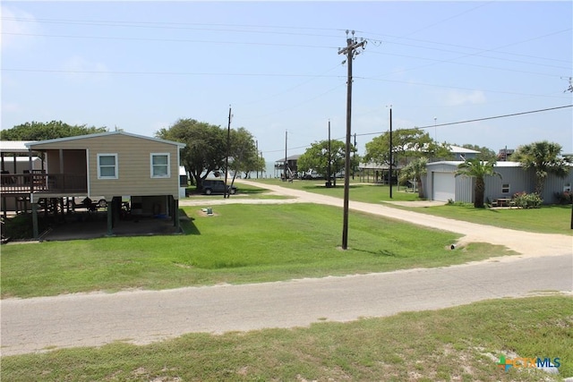 view of yard featuring a carport