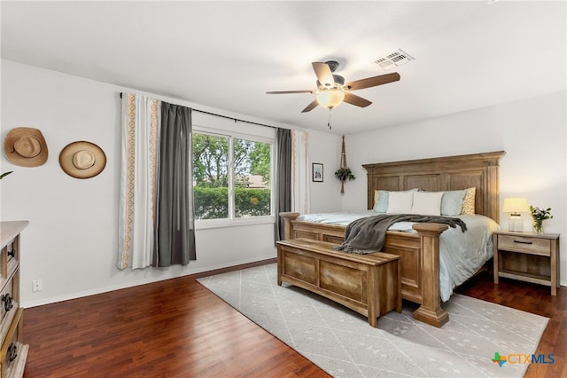 812 Merritt Dr, Lockhart, TX 78644 - bedroom with wood finished floors and a ceiling fan
