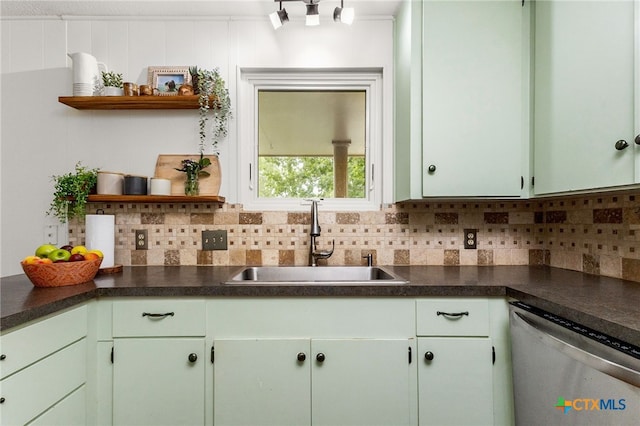 812 Merritt Dr, Lockhart, TX 78644 - kitchen featuring dishwasher, open shelves, dark countertops, and backsplash