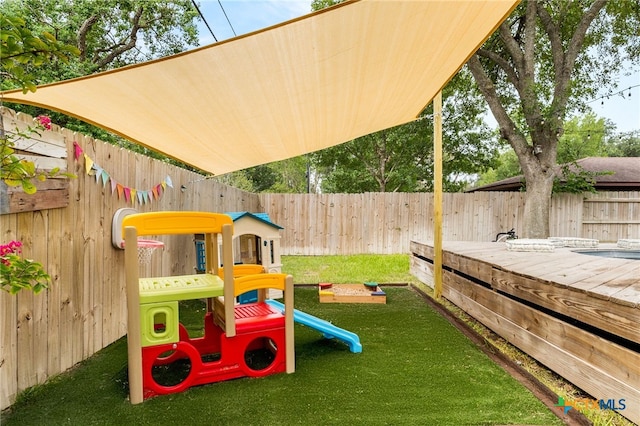 812 Merritt Dr, Lockhart, TX 78644 - view of play area featuring a fenced backyard