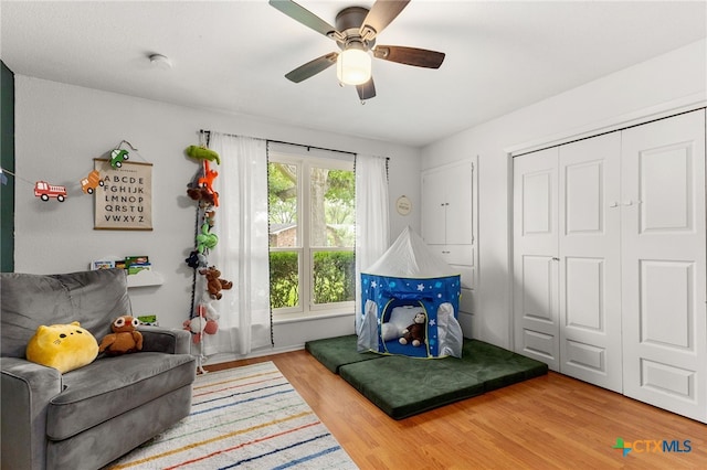 812 Merritt Dr, Lockhart, TX 78644 - living area with wood finished floors and ceiling fan