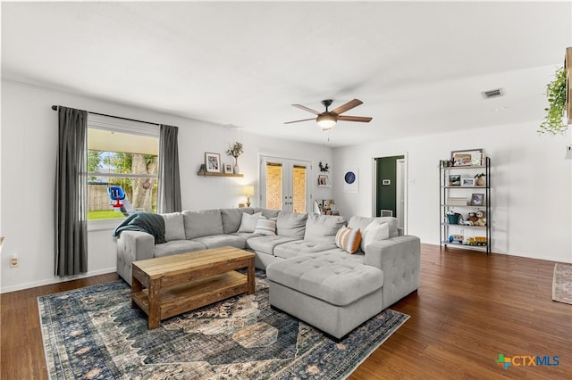 812 Merritt Dr, Lockhart, TX 78644 - living area featuring ceiling fan, french doors, and wood finished floors