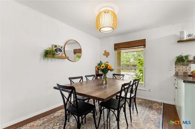 812 Merritt Dr, Lockhart, TX 78644 - dining area with wood finished floors and baseboards