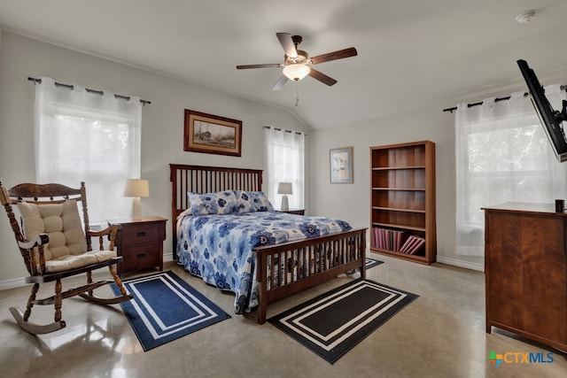 bedroom featuring ceiling fan and vaulted ceiling