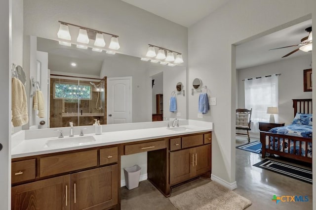 bathroom featuring concrete flooring, vanity, a wealth of natural light, and an enclosed shower