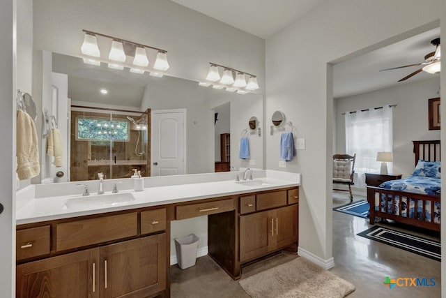 bathroom with ceiling fan, a healthy amount of sunlight, an enclosed shower, and vanity