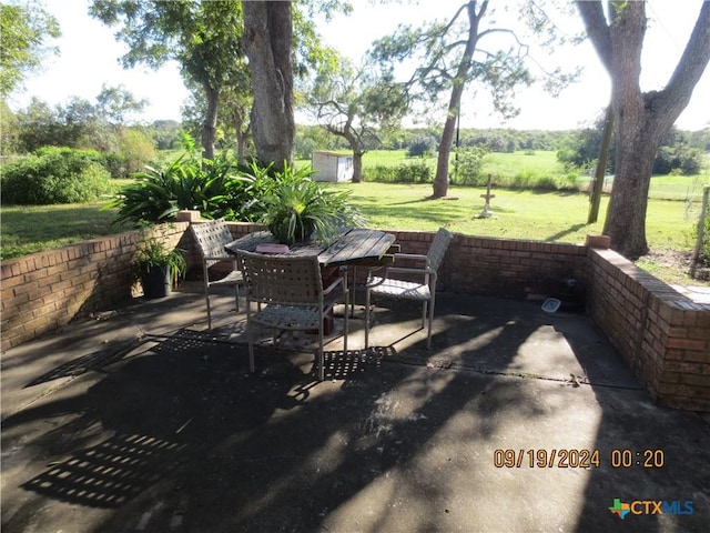 1124 Refugio Hwy, Victoria, TX 77905 - view of patio featuring outdoor dining space