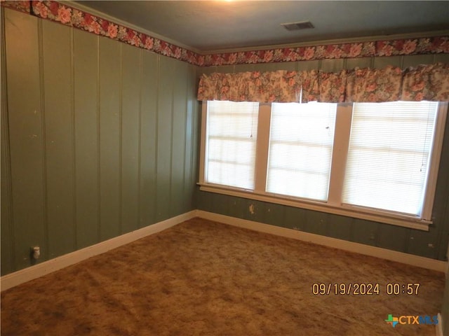 1124 Refugio Hwy, Victoria, TX 77905 - empty room featuring baseboards and carpet floors