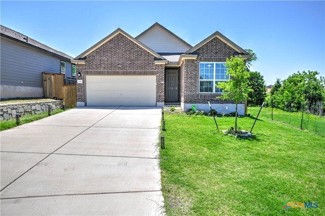 ranch-style home featuring fence, an attached garage, brick siding, and driveway