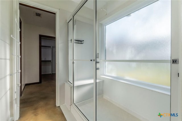 bathroom featuring concrete flooring