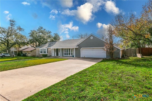 single story home with a front lawn and a garage