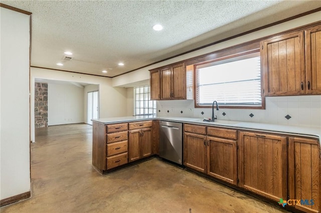 kitchen featuring kitchen peninsula, decorative backsplash, dishwasher, and a healthy amount of sunlight