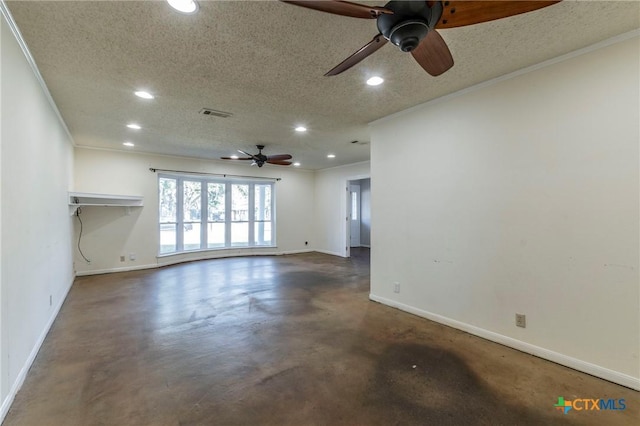 empty room with crown molding and a textured ceiling