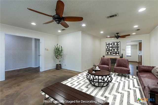 living room featuring a textured ceiling