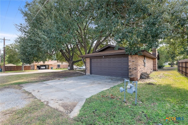 garage with a lawn