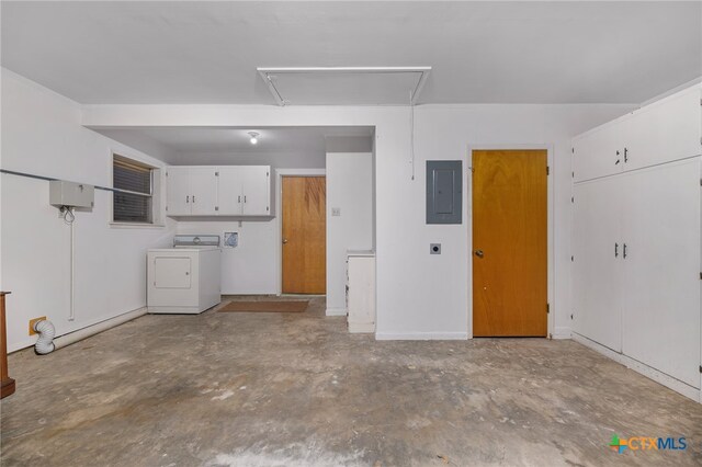 garage with washer / clothes dryer and electric panel