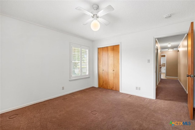 125 Hillview Dr, Luling, TX 78648 - unfurnished bedroom with carpet, baseboards, and crown molding