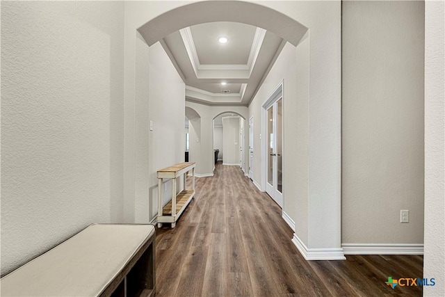 1527 Cobble Hill Ct, Temple, TX 76502 - hallway with arched walkways, dark wood-style floors, crown molding, a textured wall, and baseboards