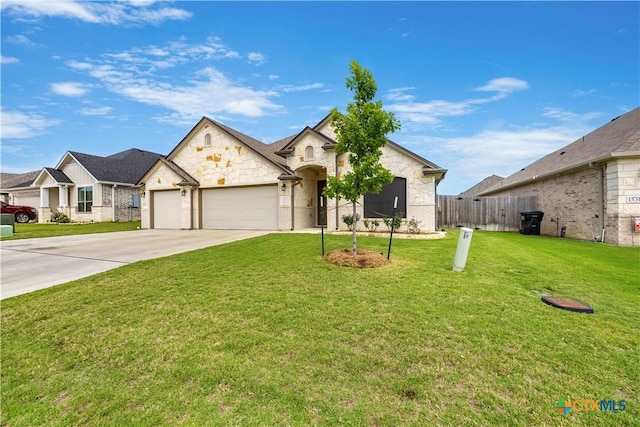 1527 Cobble Hill Ct, Temple, TX 76502 - view of front of house with an attached garage, concrete driveway, and stone siding