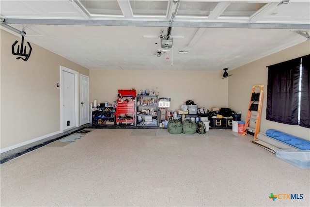 garage featuring a garage door opener