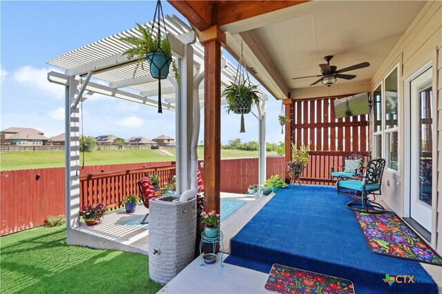 view of patio / terrace featuring a pergola and ceiling fan