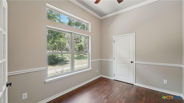 7881 Wegner Rd, New Braunfels, TX 78132 - unfurnished room with plenty of natural light, baseboards, dark wood finished floors, and crown molding