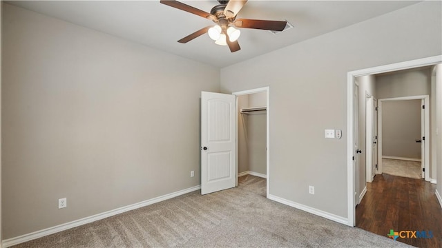 7881 Wegner Rd, New Braunfels, TX 78132 - unfurnished bedroom with baseboards, a ceiling fan, carpet floors, and a closet