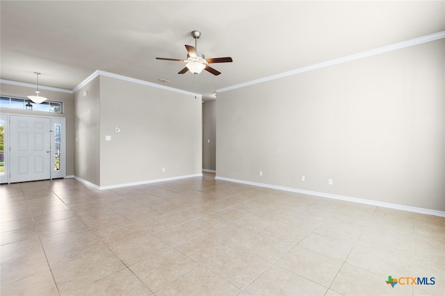 interior space with light tile patterned floors, ceiling fan, and ornamental molding