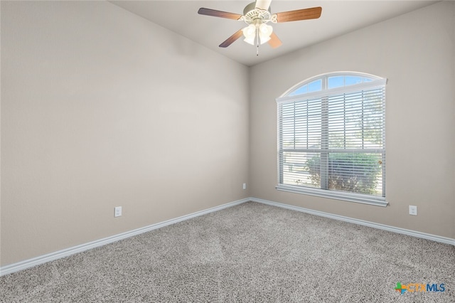 carpeted empty room with ceiling fan