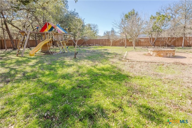 view of yard with a playground