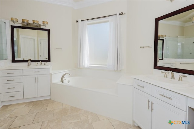 bathroom with vanity, ornamental molding, and shower with separate bathtub