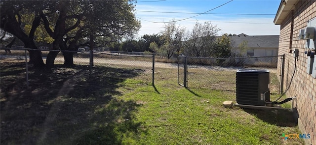 view of yard with central AC unit