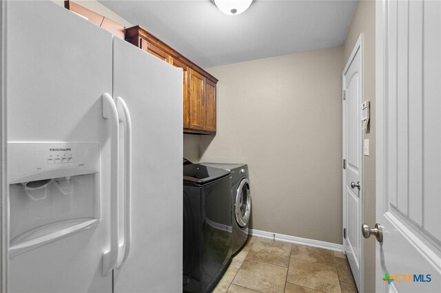 203 Terravista Trl, Victoria, TX 77904 - laundry room with independent washer and dryer, cabinet space, and baseboards