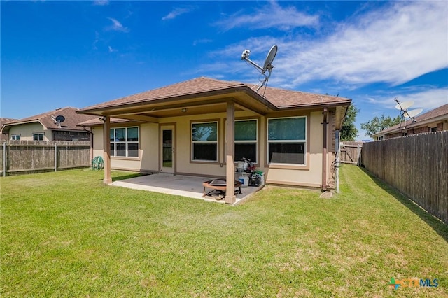 203 Terravista Trl, Victoria, TX 77904 - back of house featuring a patio area and stucco siding
