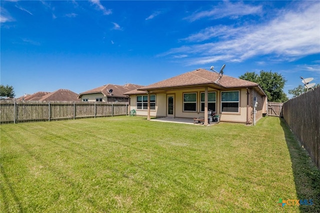 203 Terravista Trl, Victoria, TX 77904 - back of property featuring a patio and stucco siding