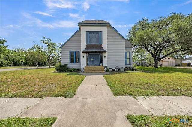 bungalow-style house featuring a front lawn