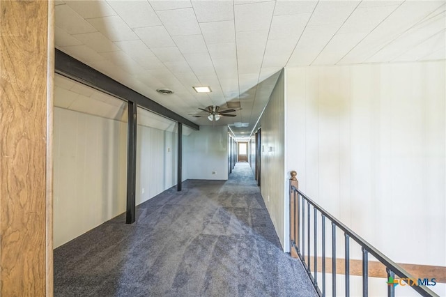 hall featuring carpet