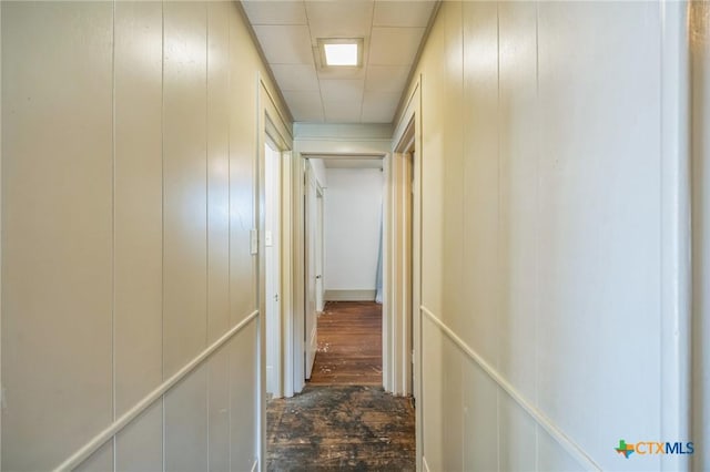 corridor with a decorative wall