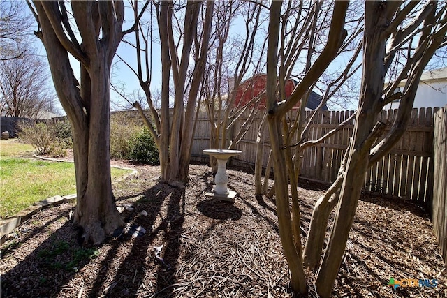 view of yard featuring fence