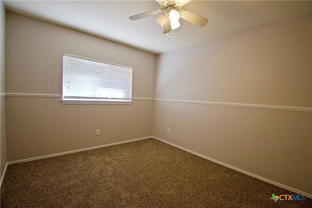 unfurnished room featuring baseboards, carpet floors, and a ceiling fan