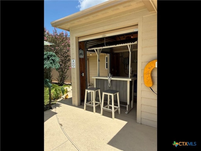 105 Brentwood Pl, Port Lavaca, TX 77979 - view of patio with a garage