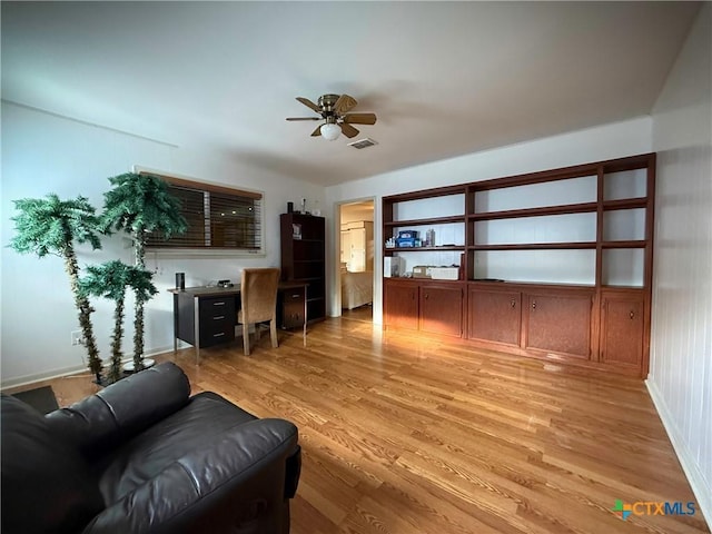 105 Brentwood Pl, Port Lavaca, TX 77979 - living area featuring ceiling fan and light wood-style floors