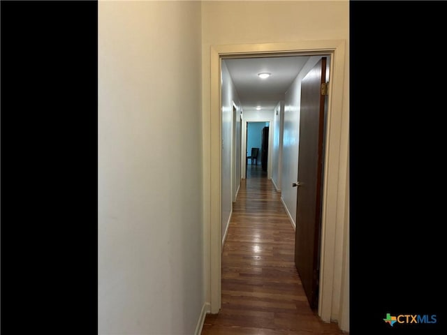 105 Brentwood Pl, Port Lavaca, TX 77979 - hall with wood finished floors and baseboards