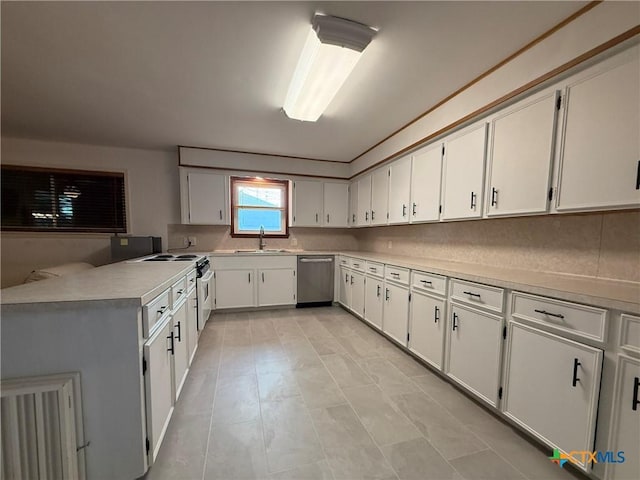 105 Brentwood Pl, Port Lavaca, TX 77979 - kitchen with appliances with stainless steel finishes, light countertops, and white cabinetry