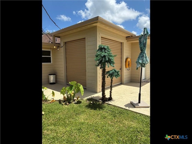105 Brentwood Pl, Port Lavaca, TX 77979 - view of outbuilding featuring a garage