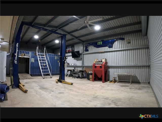 105 Brentwood Pl, Port Lavaca, TX 77979 - garage with metal wall and ceiling fan