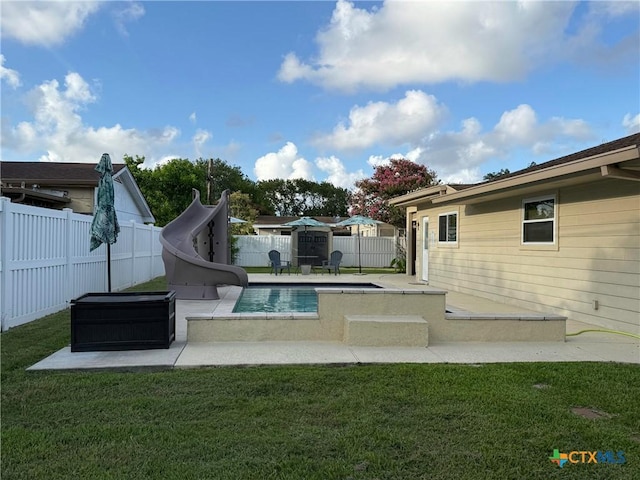 105 Brentwood Pl, Port Lavaca, TX 77979 - view of pool with a water slide, a fenced backyard, and a patio