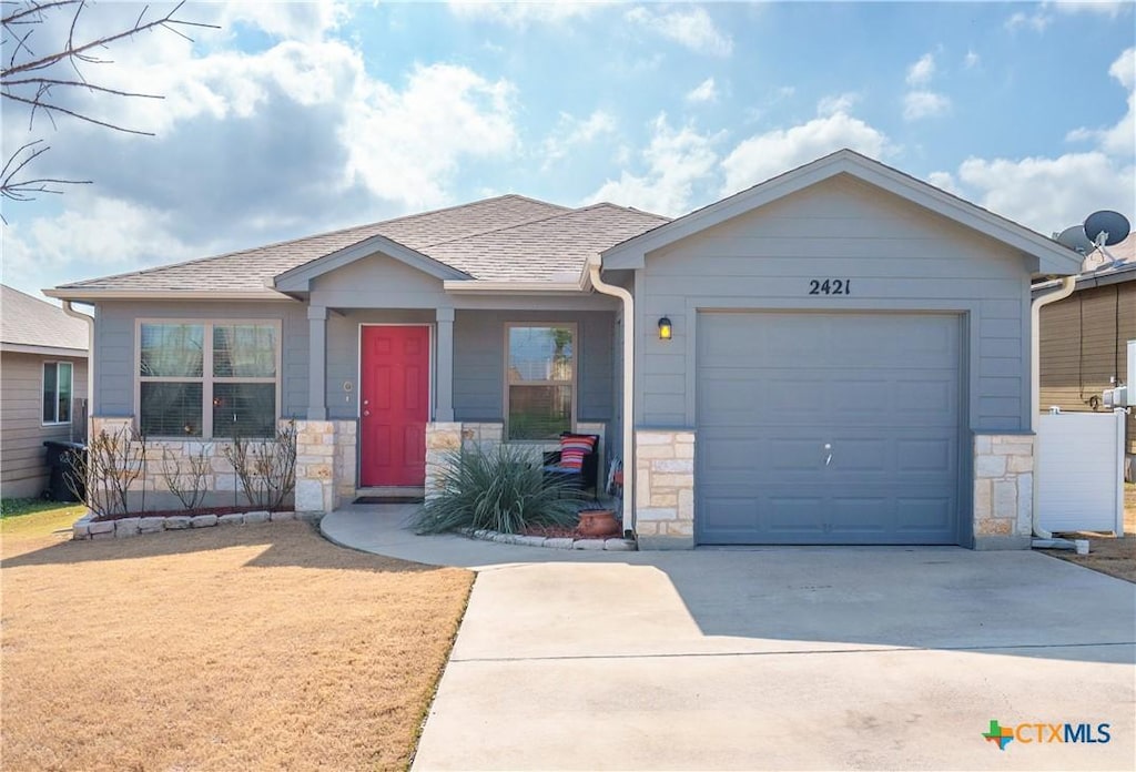 view of front of property featuring a garage