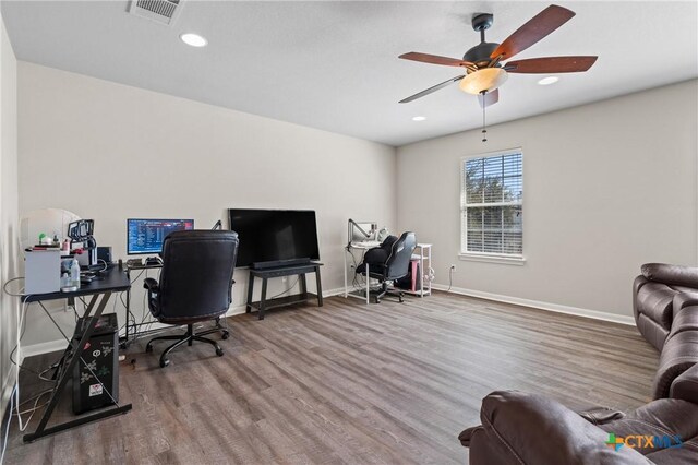 office space with visible vents, recessed lighting, baseboards, and wood finished floors