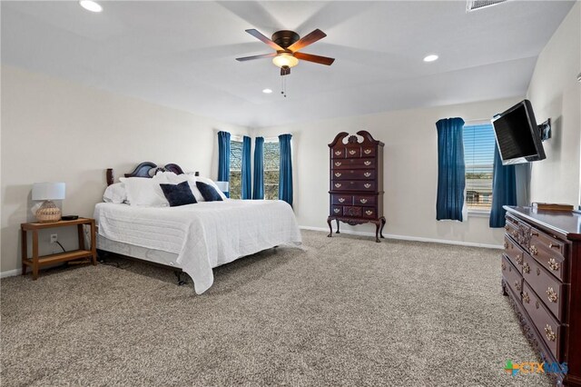 bedroom featuring light carpet, recessed lighting, baseboards, and ceiling fan